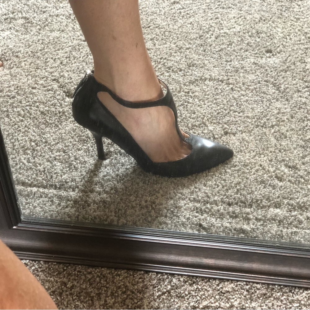 Fabulous t strap heels.  Elegant. Black leather
